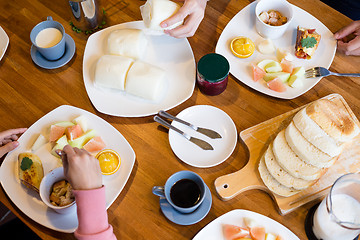 Image showing Group of people having breakfast together