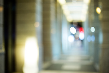 Image showing Abstract urban background with blurred buildings and street