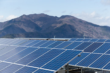 Image showing Solar panel with mountain background