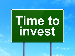Image showing Time concept: Time To Invest on road sign background