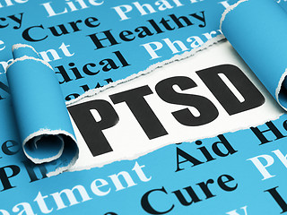Image showing Healthcare concept: black text PTSD under the piece of  torn paper