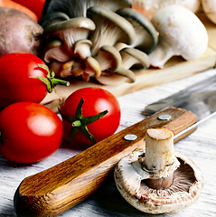 Image showing  knife and mushrooms