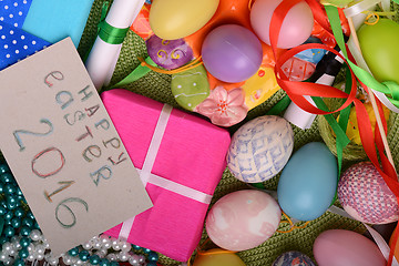 Image showing easter eggs with flowers and gift box 