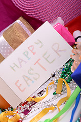 Image showing Easter background with eggs, ribbons and spring decoration