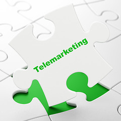 Image showing Marketing concept: Telemarketing on puzzle background