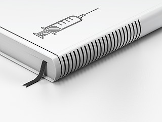 Image showing Health concept: closed book, Syringe on white background