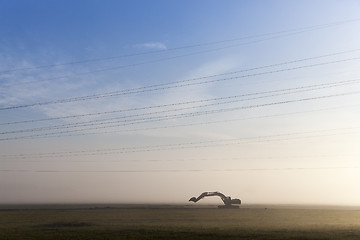 Image showing Excavator in a fog 