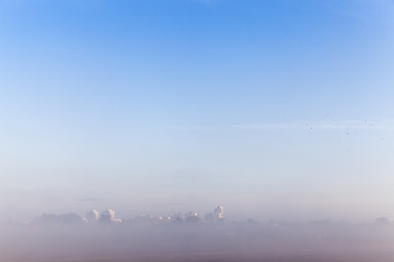 Image showing morning city in the fog  