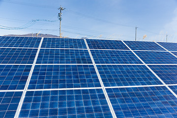 Image showing Solar panel with power lines