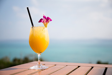 Image showing Orange juice in outdoor restaurant