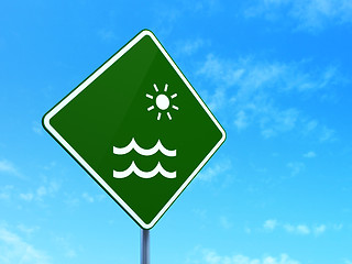 Image showing Vacation concept: Beach on road sign background