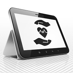 Image showing Insurance concept: Tablet Computer with Heart And Palm on display