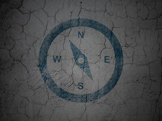 Image showing Tourism concept: Compass on grunge wall background