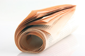 Image showing newspaper rolled