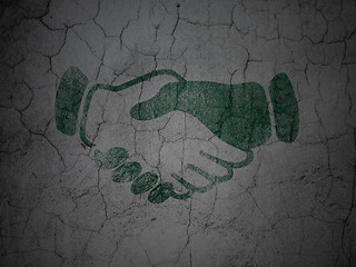 Image showing Business concept: Handshake on grunge wall background