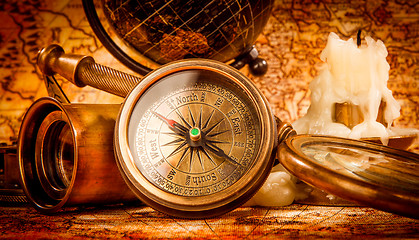 Image showing Vintage still life. Vintage items on ancient map.