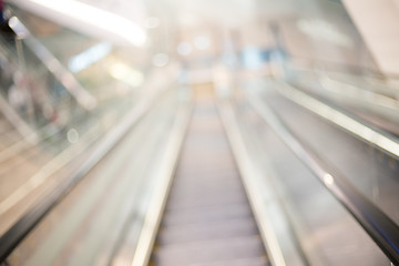 Image showing Blur escalator in shopping mall with bokeh for background