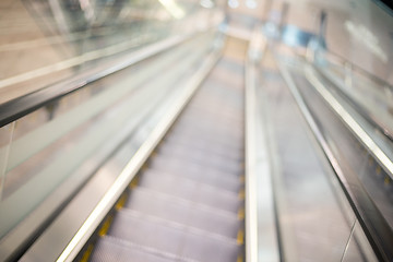 Image showing Escalator blur background with bokeh