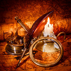 Image showing Vintage still life. Vintage items on ancient map.