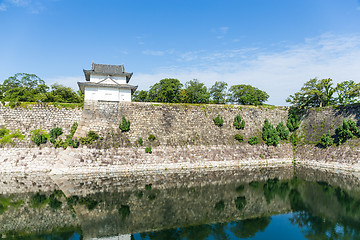 Image showing Osaka Castle wall at riverside in Japan