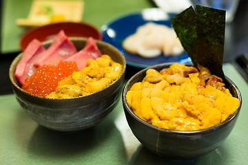 Image showing Japanese bowl of rice, Tuna, roe and sea urchin 