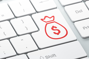 Image showing Banking concept: Money Bag on computer keyboard background