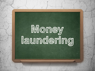 Image showing Money concept: Money Laundering on chalkboard background