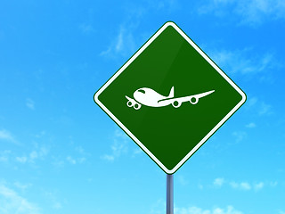 Image showing Tourism concept: Airplane on road sign background