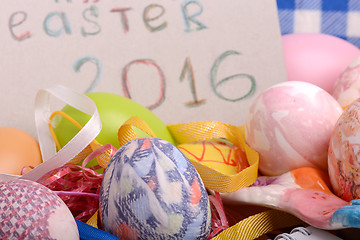 Image showing Easter background with eggs, ribbons and spring decoration