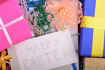 Image showing Easter background with eggs, ribbons and spring decoration