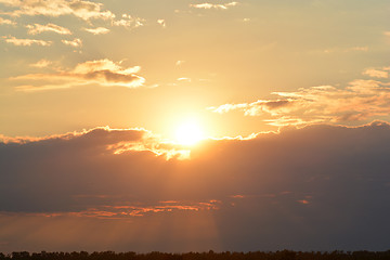 Image showing Fiery orange sunset sky. Beautiful sky.