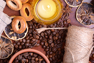 Image showing Vintage still life with coffee beans on wooden background