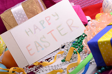 Image showing Easter background with eggs, ribbons and spring decoration