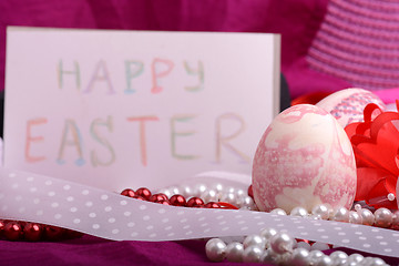 Image showing Easter background with eggs, ribbons and spring decoration