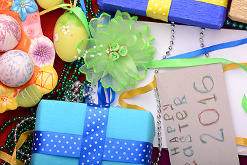 Image showing Easter background with eggs, ribbons and spring decoration