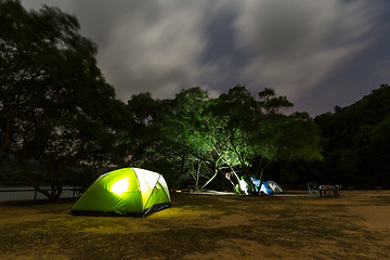 Image showing Campsite with illuminated tent 