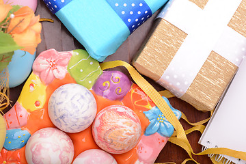 Image showing Easter background with Easter eggs and gift box