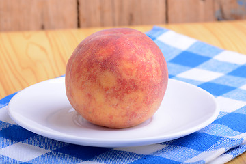 Image showing fresh peach on white plate