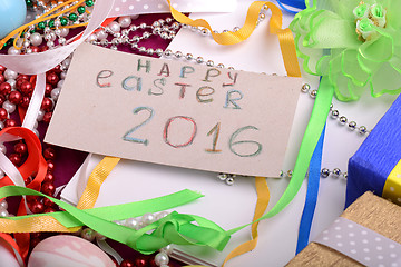 Image showing Easter background with eggs, ribbons and spring decoration