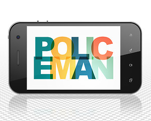 Image showing Law concept: Smartphone with Policeman on  display