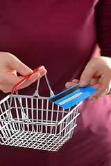 Image showing Shopping with shopping basket and credit card