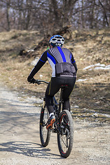 Image showing Cyclist riding mountain bike