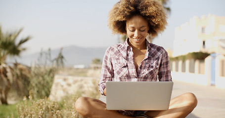 Image showing Girl Working With A Laptop Outdoors