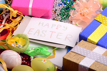 Image showing Easter background with eggs, ribbons and spring decoration