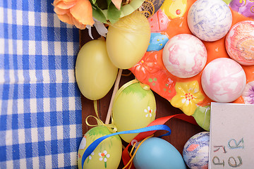 Image showing Happy Easter invitation card, hand made eggs at a gift box