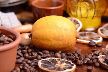 Image showing Vintage still life with coffee beans on wooden background