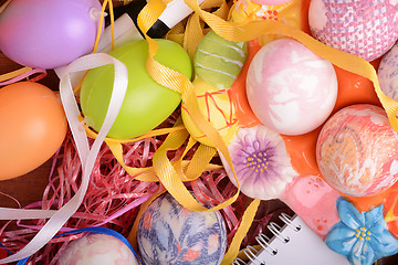 Image showing Easter background with eggs, ribbons and spring decoration