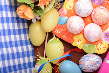 Image showing Easter background with eggs, ribbons and spring decoration