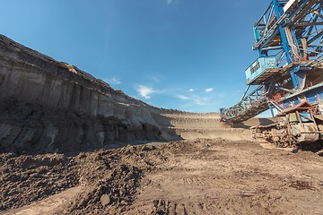Image showing Large excavator machine in the mine