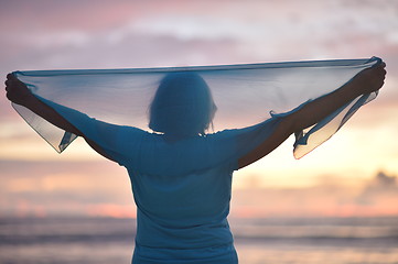 Image showing Elderly woman at sunset